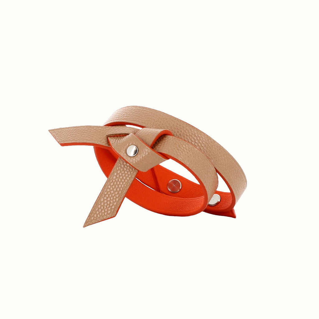 Bracelet Phi noué bicolore beige grain caviar / orange de Phi1618, accessoire de mode haut de gamme